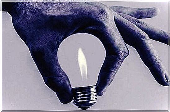 Light in hand forms light bulb