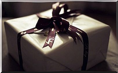 A wrapped gift with gift ribbon