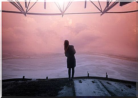 Woman standing in front of sea