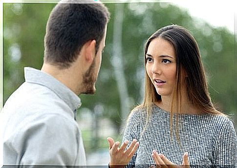 Woman discusses with man about being a coward