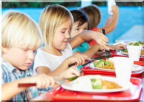 Children learn to eat new things as part of dining in schools