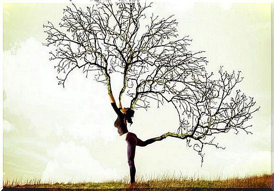 Trees grow out of a woman's arms and legs symbolizing the power of compliments