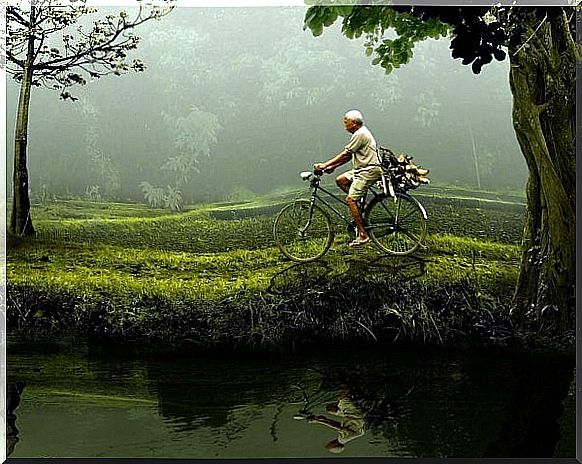 Person with self-confidence bikes of difficult road