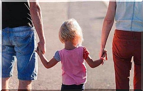 Parents go for a walk with their child