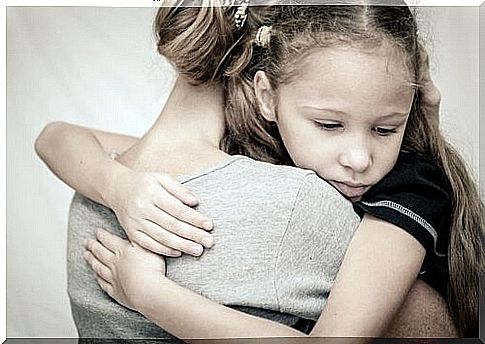 Mother hugs child and shows that Depression can affect the relationship between mother and child