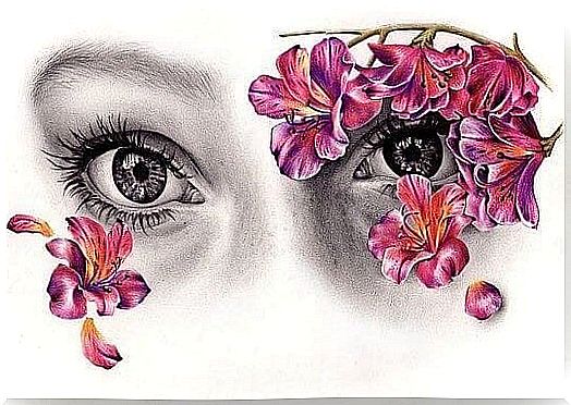 Woman with flowers in front of her eyes like a mask