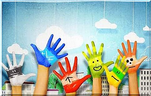 Painted hands illustrate the importance of art for children's development