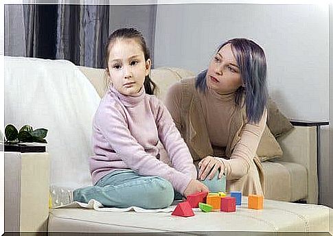 Mom tries to make contact with girl on sofa