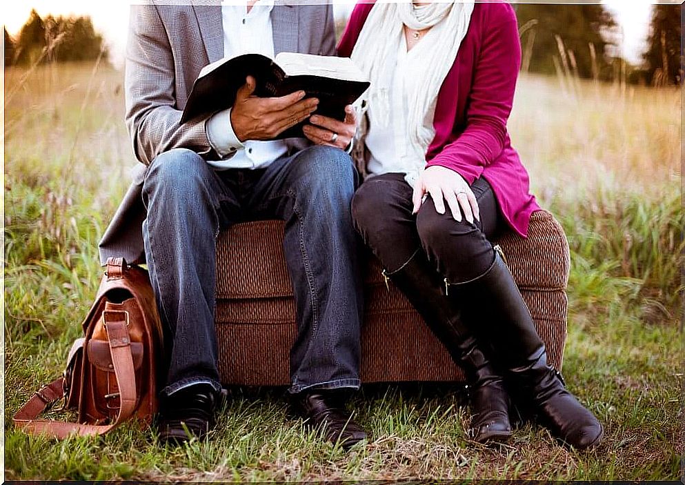 Couples with book enjoy talking about love