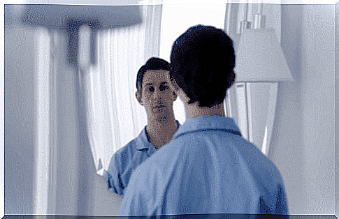 Man looking in mirror