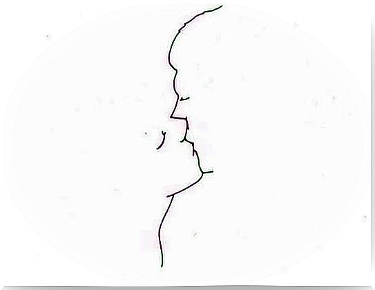 Silhouette of couple kissing, as a sign of affection