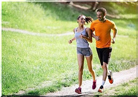 Two people running together