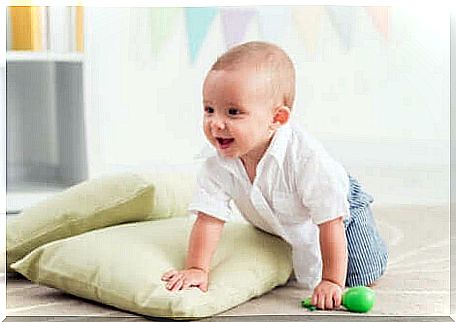 Toddler crawling on pillow