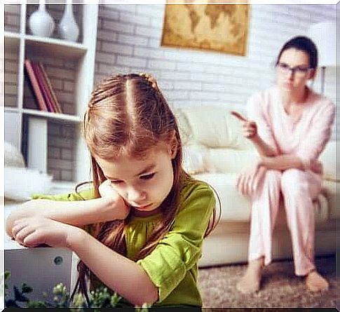 Woman scolding girl illustrates punishment in educational contexts