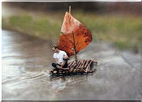 Man on a small raft