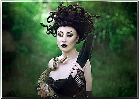 Woman with snake in forest illustrates Medusa