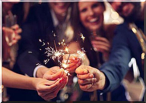 festive atmosphere with sparklers, as one of the traditions of Christmas