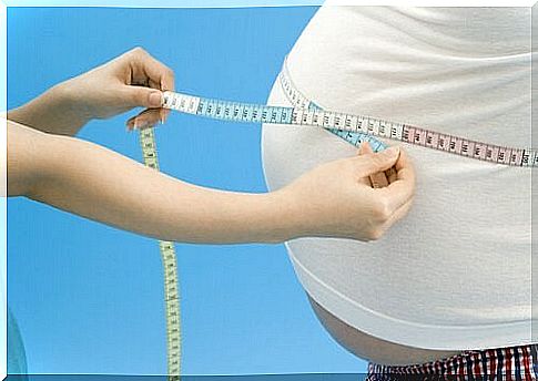 Obesity on television is illustrated by woman measuring big belly