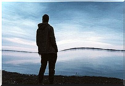 man looks out over the sea