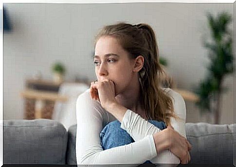 nervous woman on sofa