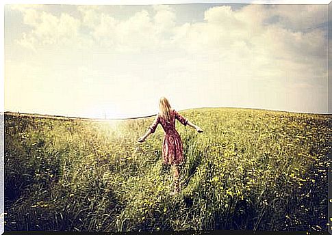 Woman walking in a field