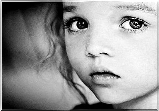 Child with intense gaze in eyes